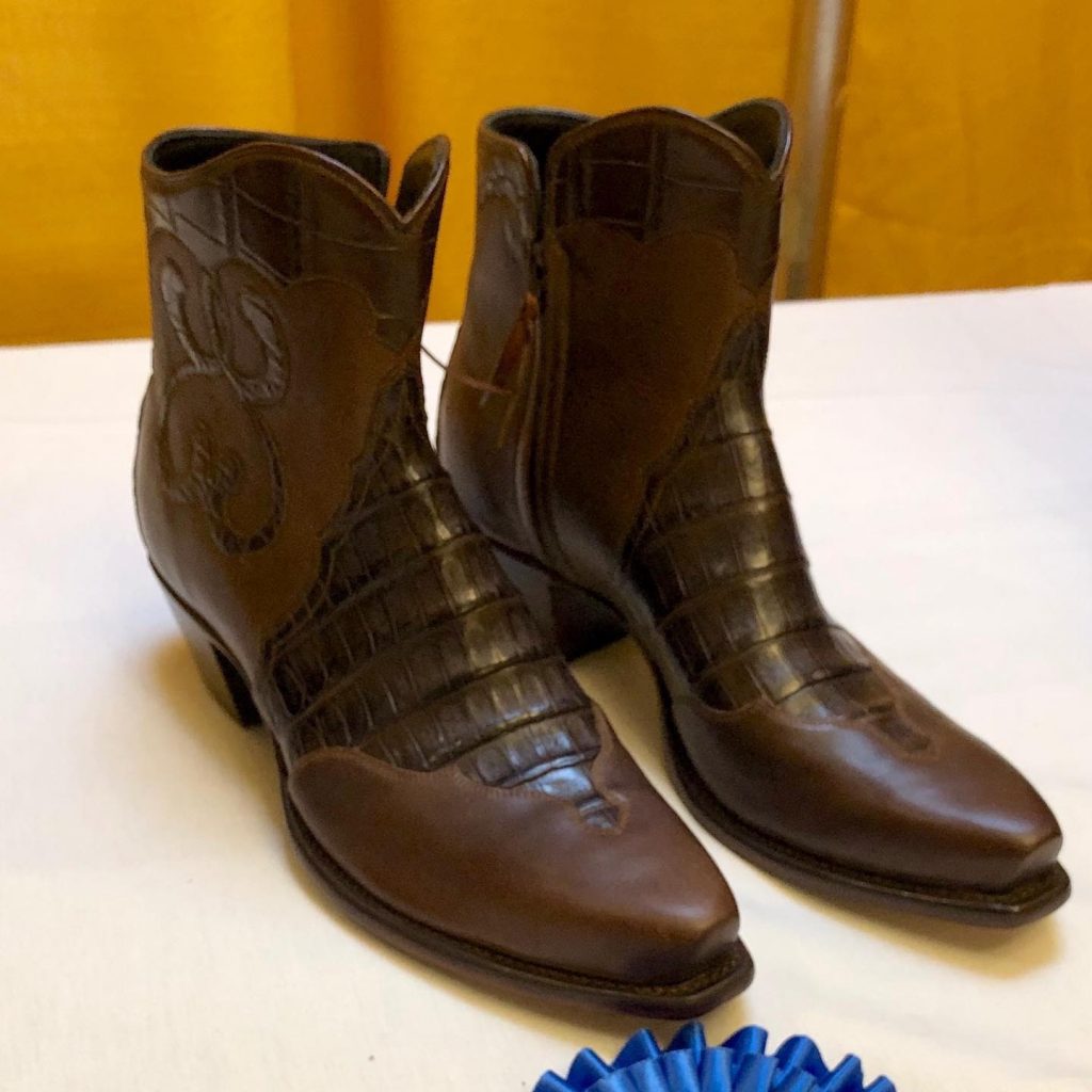 A pair of brown cowboy boots