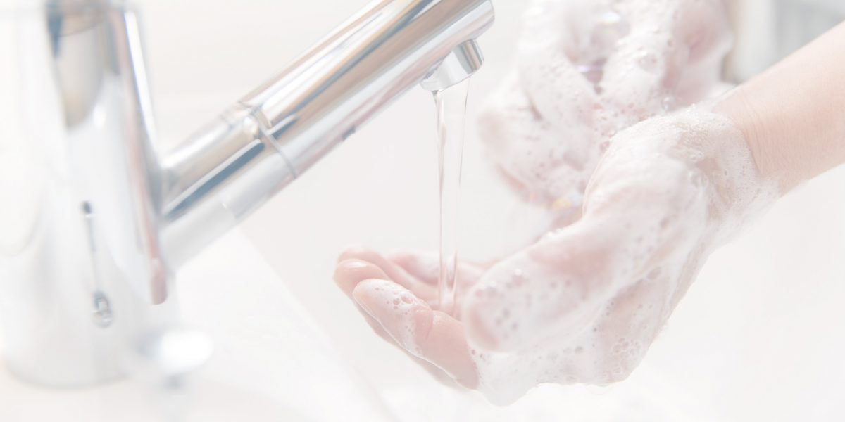 An image of a person washing their hands.