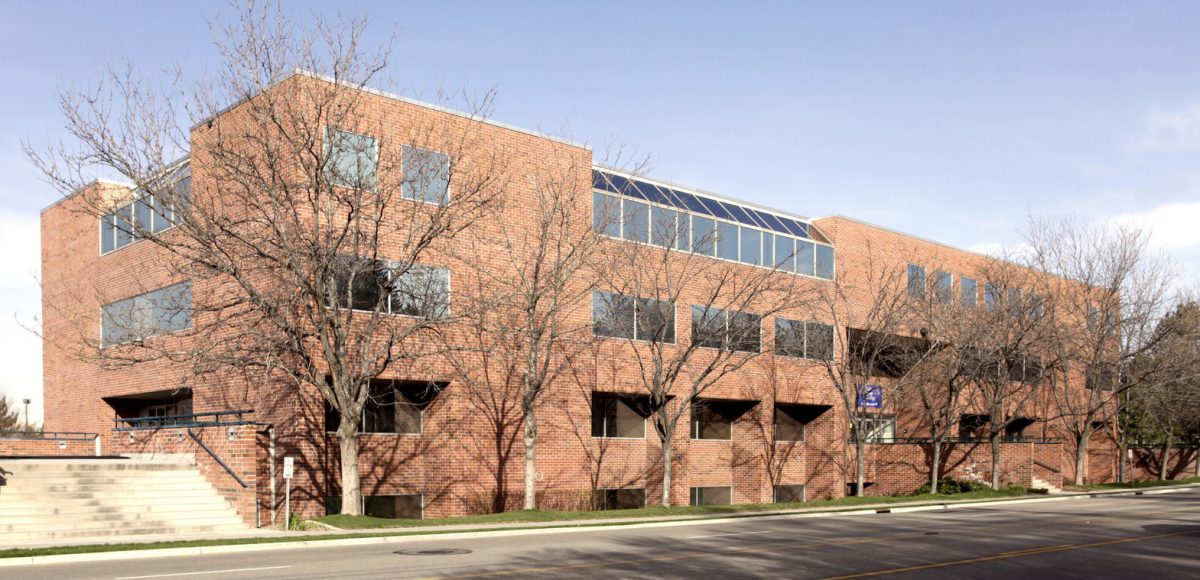 A brown brick office building.