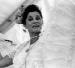 Teaching artist Monica Gomez Rogerson performing a folk dance