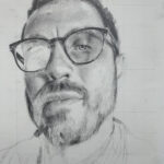 a pencil drawing of a man with glasses and a short beard. One eye and the neck are unfinished.