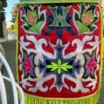 An intricately beaded sample cloth from Native American regalia